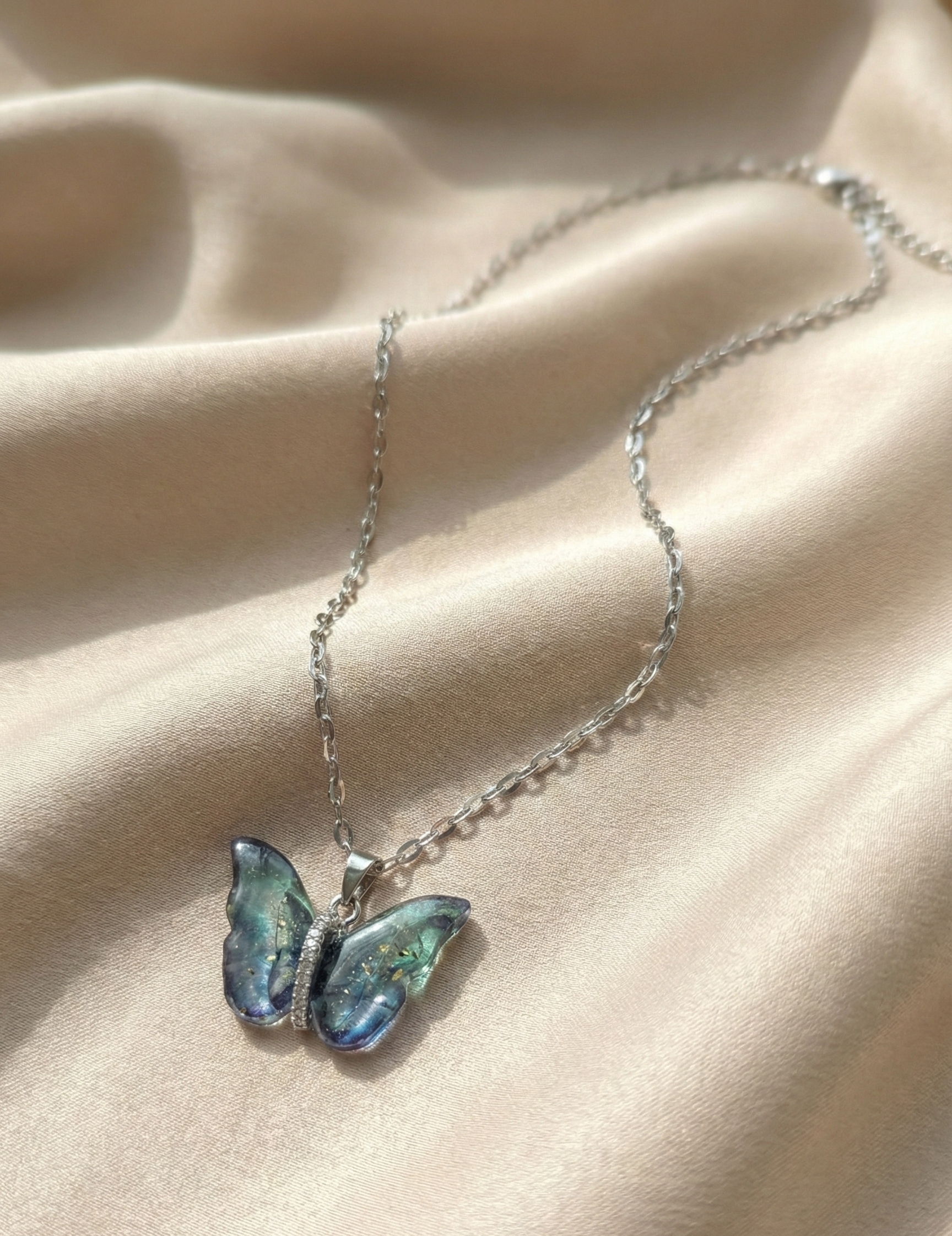 Mystic Blue–Green Butterfly Pendant by Lumina Craft