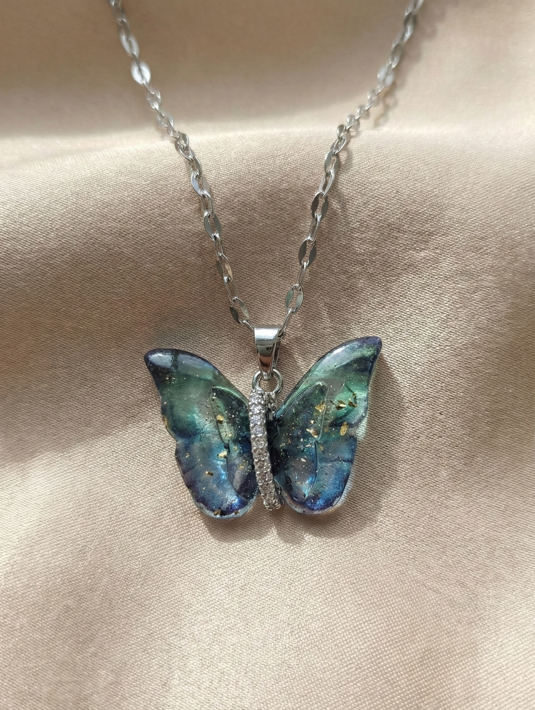 Mystic Blue–Green Butterfly Pendant by Lumina Craft